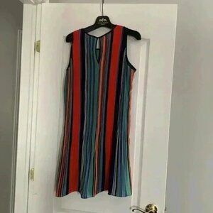 Beautiful vibrant colours summer dress. Very light.  Has a flare in the bottom